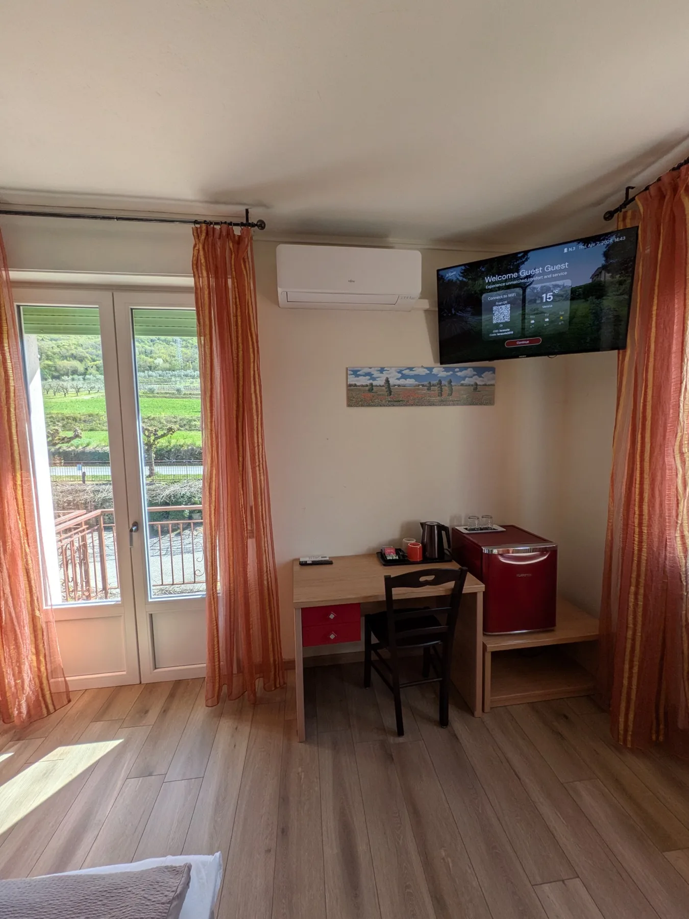Room detail with light curtains and natural light